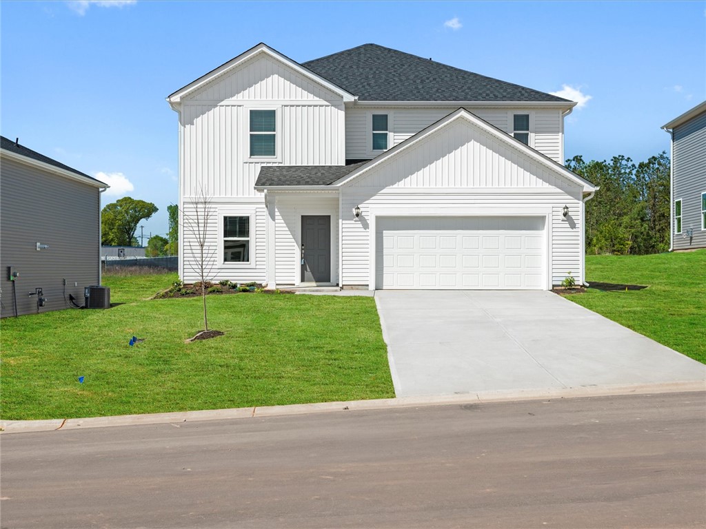 127 Blooming Mdw Road Piedmont, SC 29673 - Photo 1 of 3 A newly constructed residence presents a two-car garage and a fresh, clean facade.