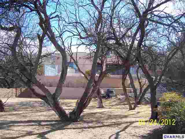 14765 West Jalisco Road Arivaca, AZ 85601 - Photo 4 of 24 a view of a house with a yard