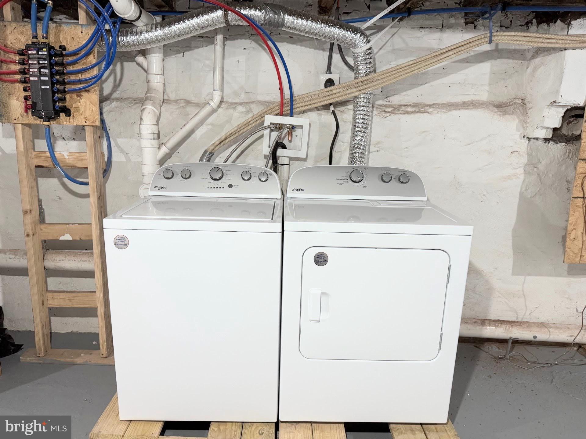 319 East Lehigh Avenue, Unit 1 Philadelphia, PA 19125 - Photo 13 of 21 a utility room with dryer and washer