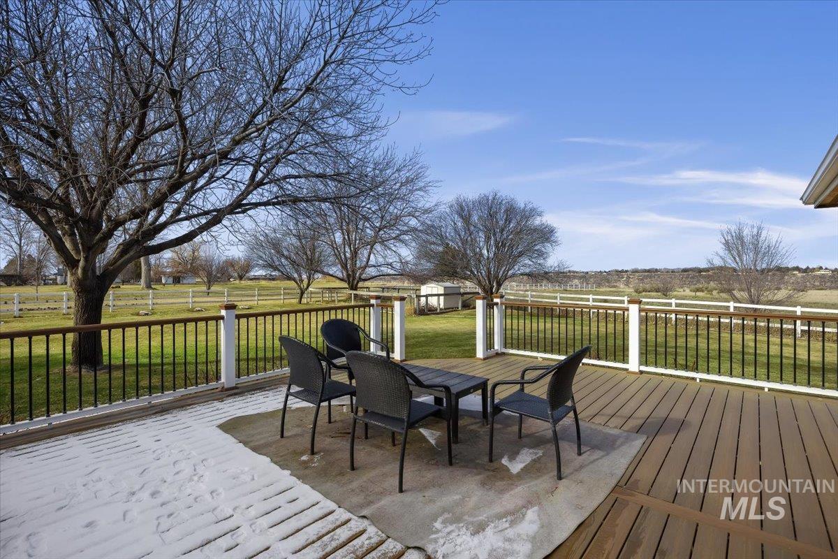 474 Kay Drive Twin Falls, ID 83301 - Photo 33 of 38 Wooden terrace featuring outdoor dining area and a yard