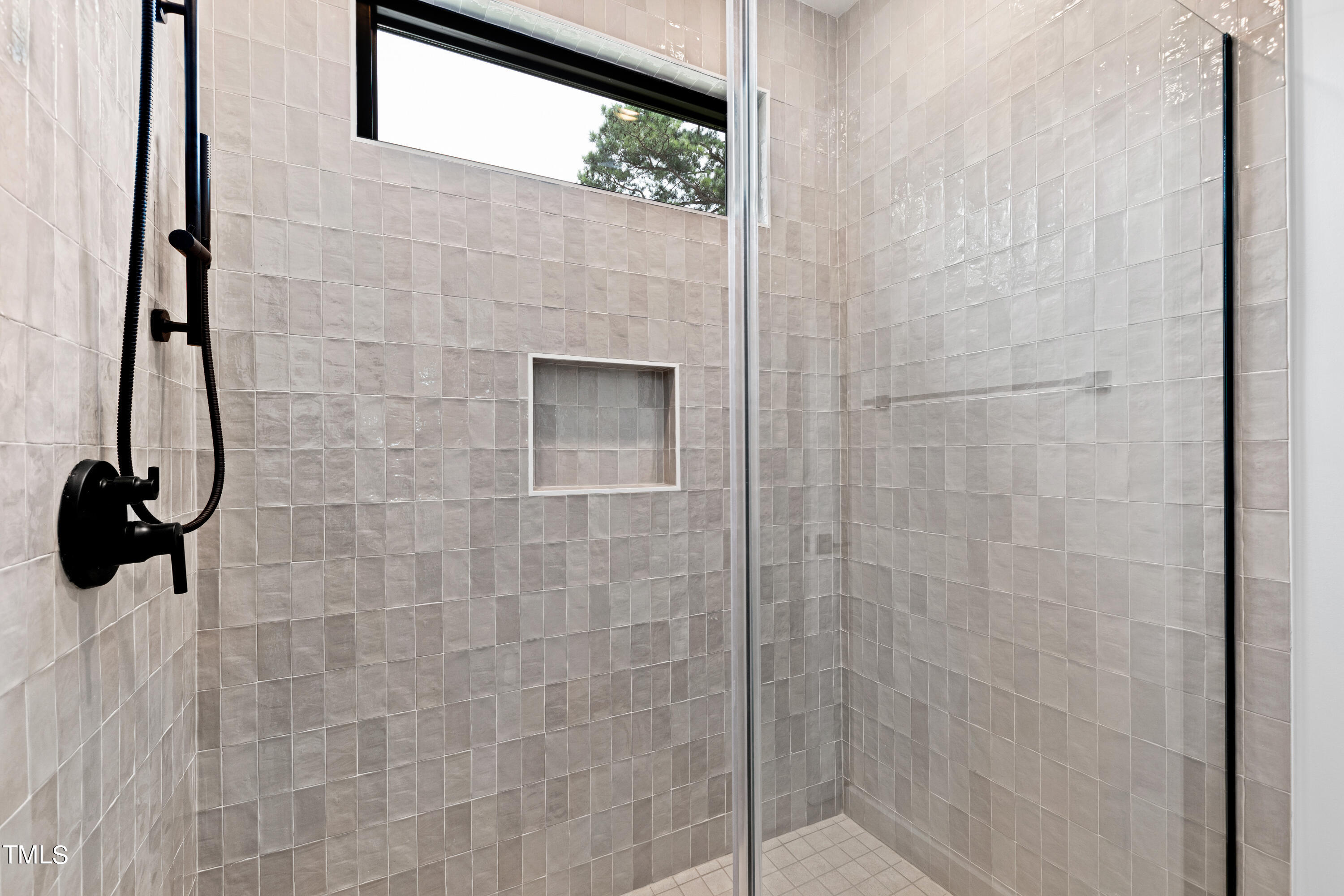 716 Brighton Road, Unit 101 Raleigh, NC 27610 - Photo 41 of 67 a bathroom with a shower