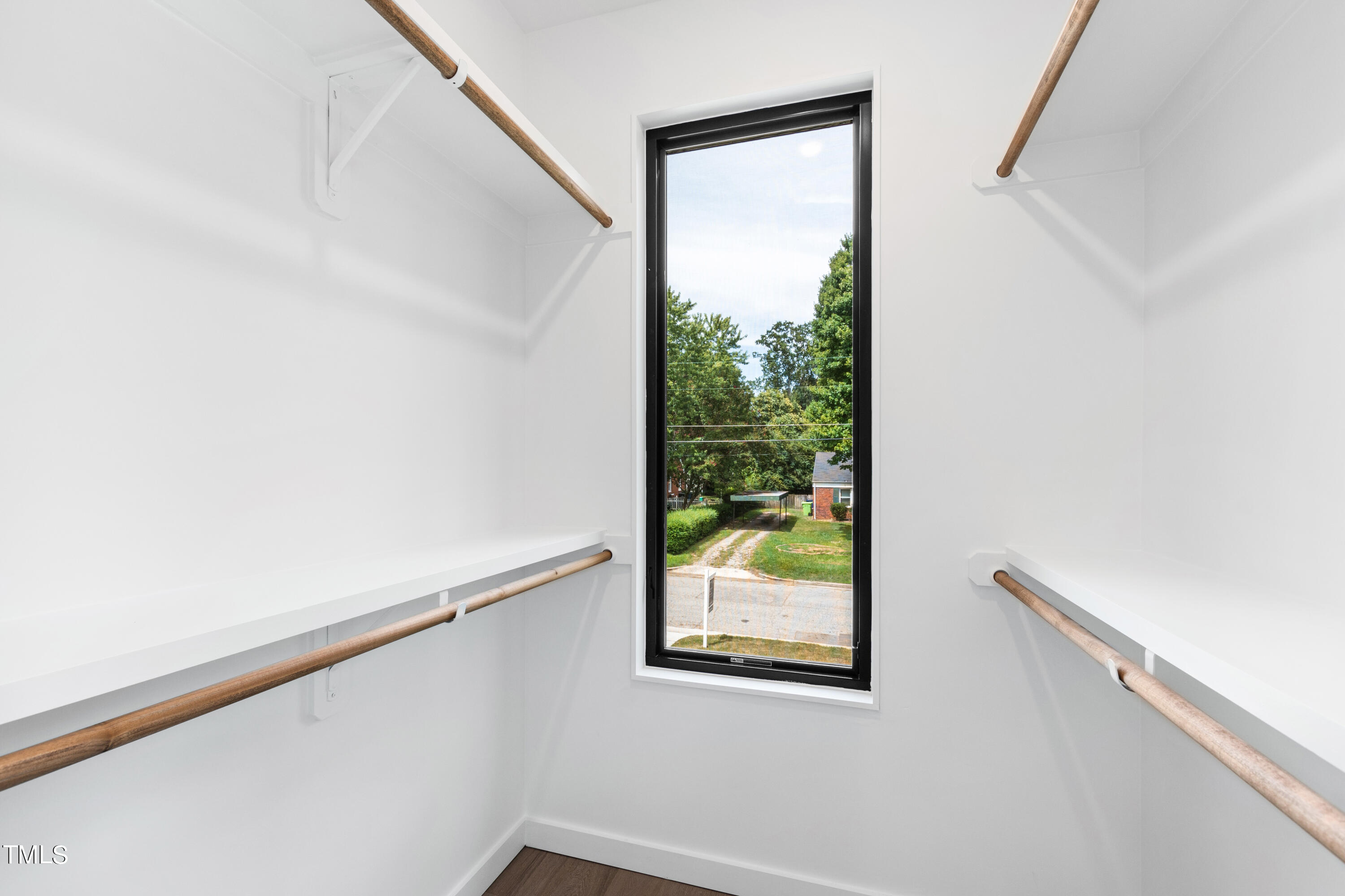 716 Brighton Road, Unit 101 Raleigh, NC 27610 - Photo 44 of 67 a view of a hallway with a window