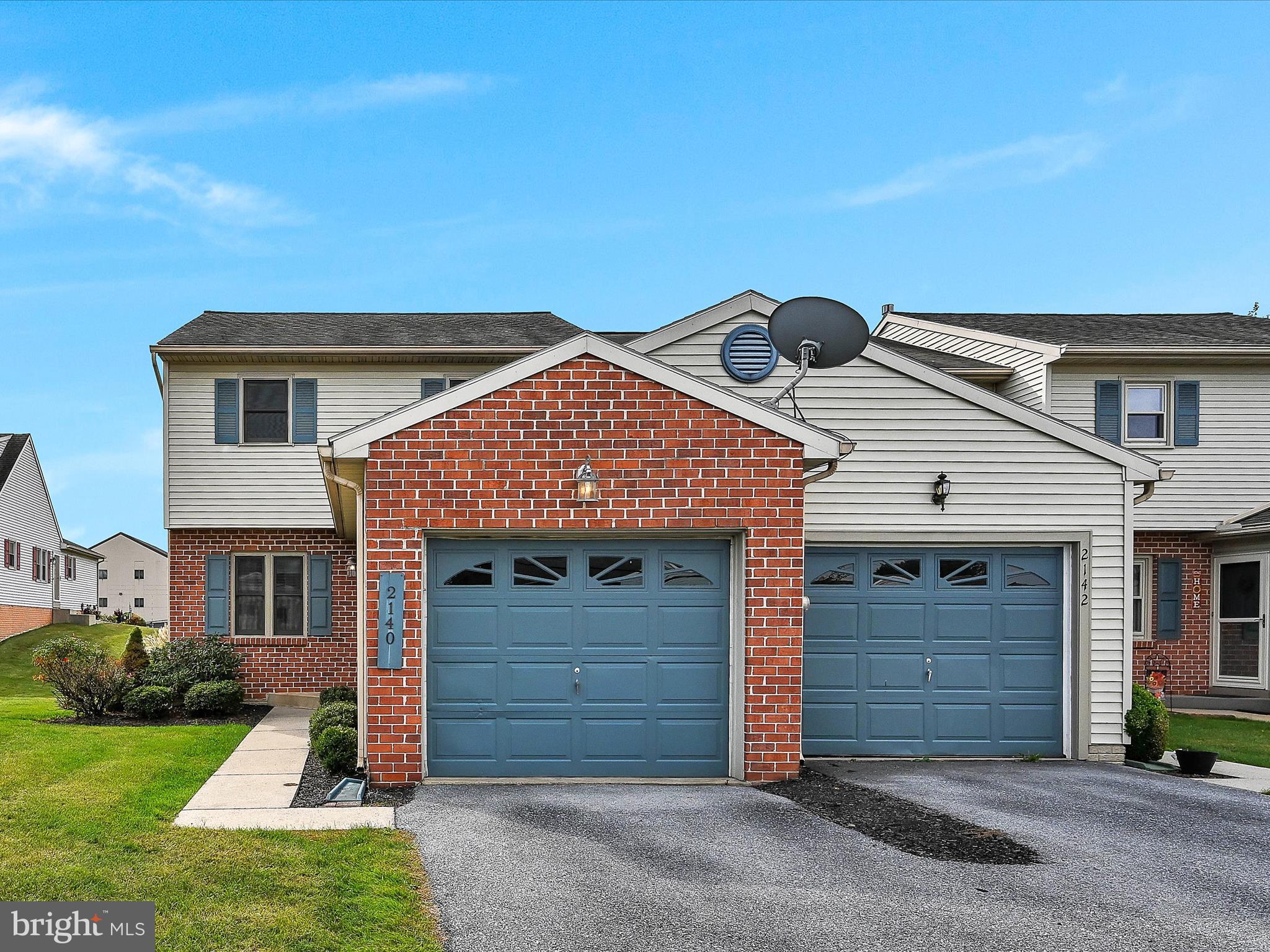 2140 Walnut Street Lebanon, PA 17042 - Photo 2 of 26 a front view of a house with a yard