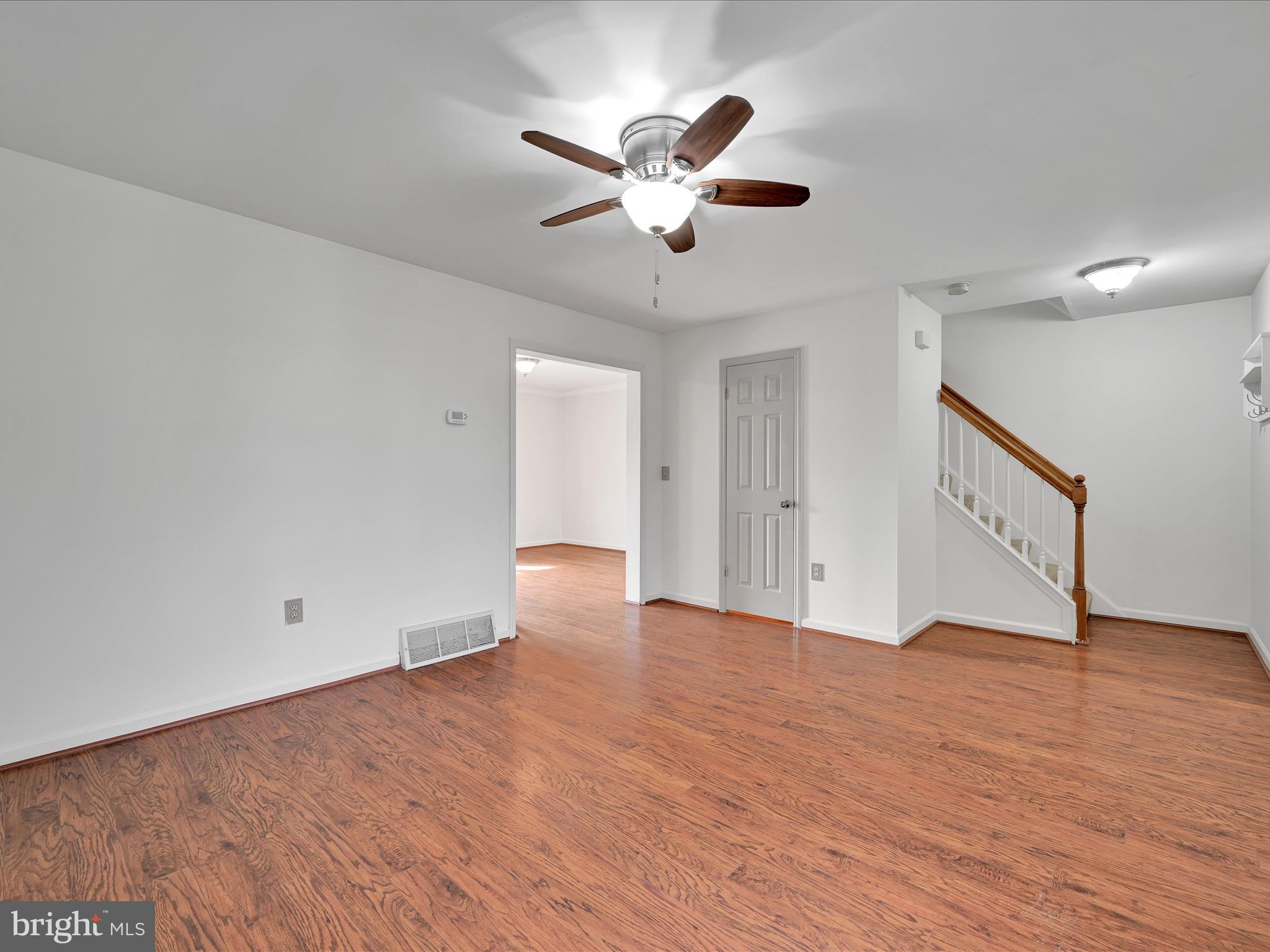 2140 Walnut Street Lebanon, PA 17042 - Photo 5 of 26 a view of an empty room with wooden floor