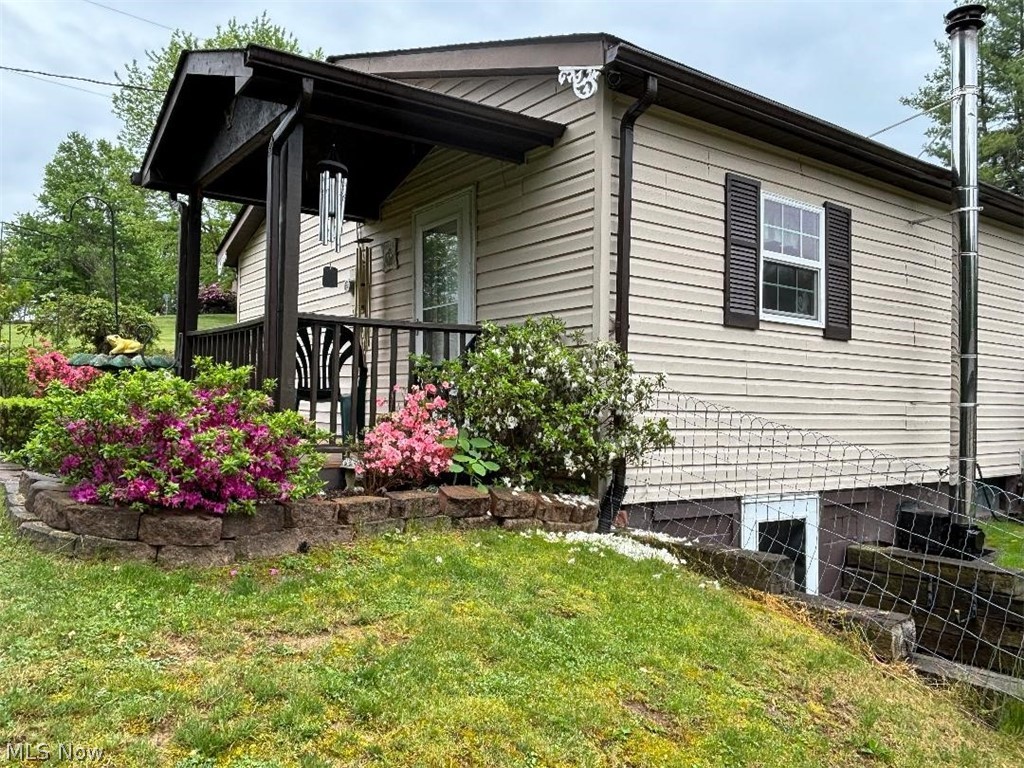 2417 Mc Adoo Ridge Road Wellsburg, WV 26070 - Photo 1 of 33 View of property exterior with a yard