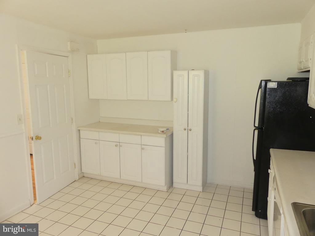 8016 Sagramore Road Baltimore, MD 21237 - Photo 11 of 30 Kitchen w/extra cabinets