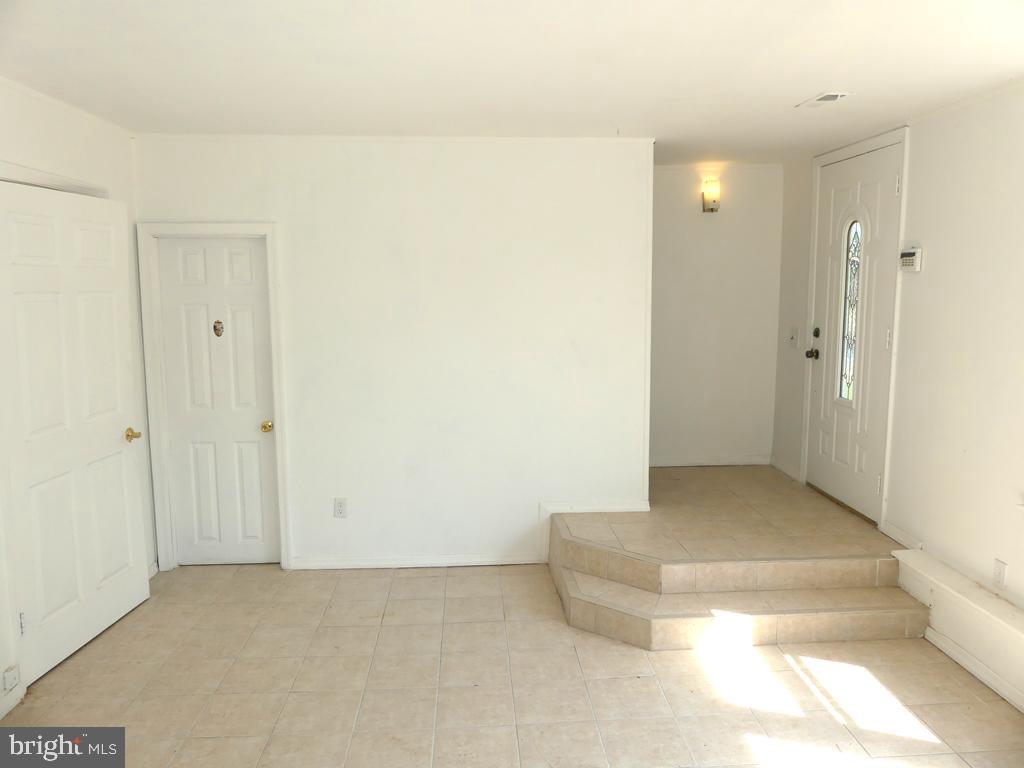 8016 Sagramore Road Baltimore, MD 21237 - Photo 6 of 30 Family Room w/Ceramic Tile Floor