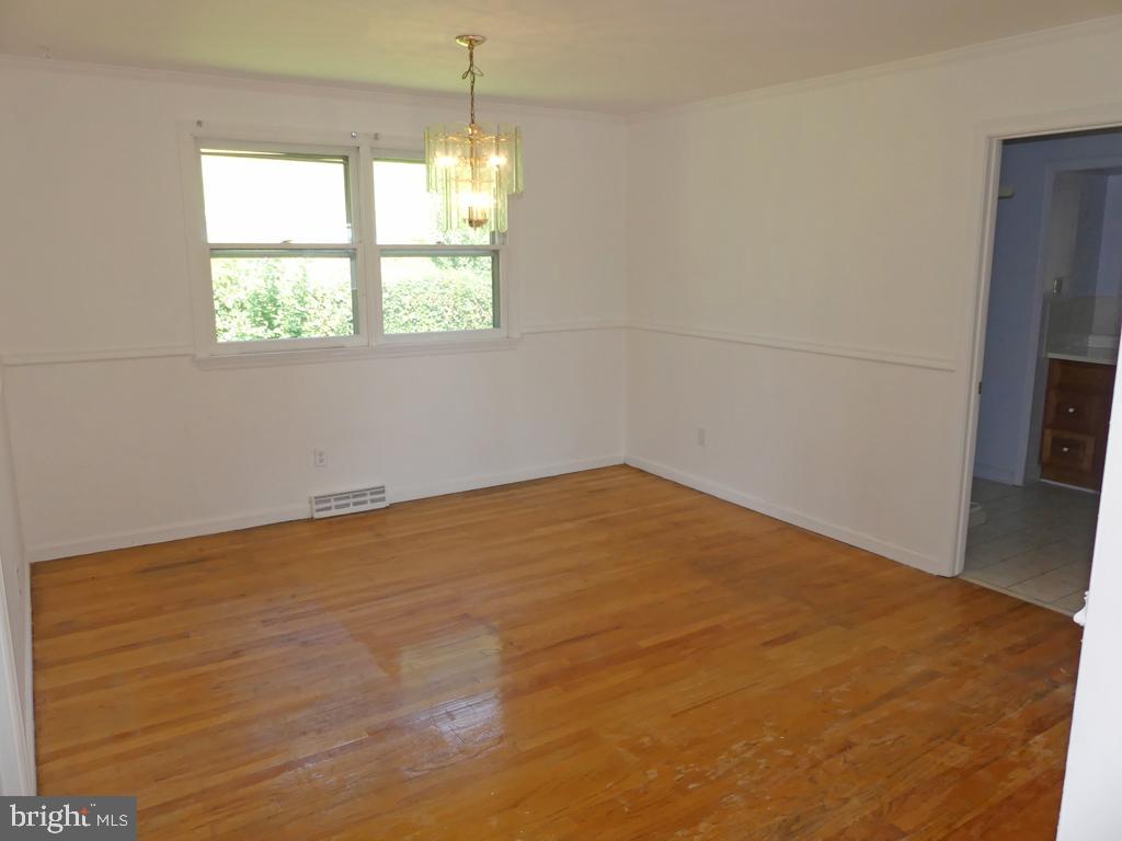 8016 Sagramore Road Baltimore, MD 21237 - Photo 9 of 30 Dining Room w/Hardwood Floor