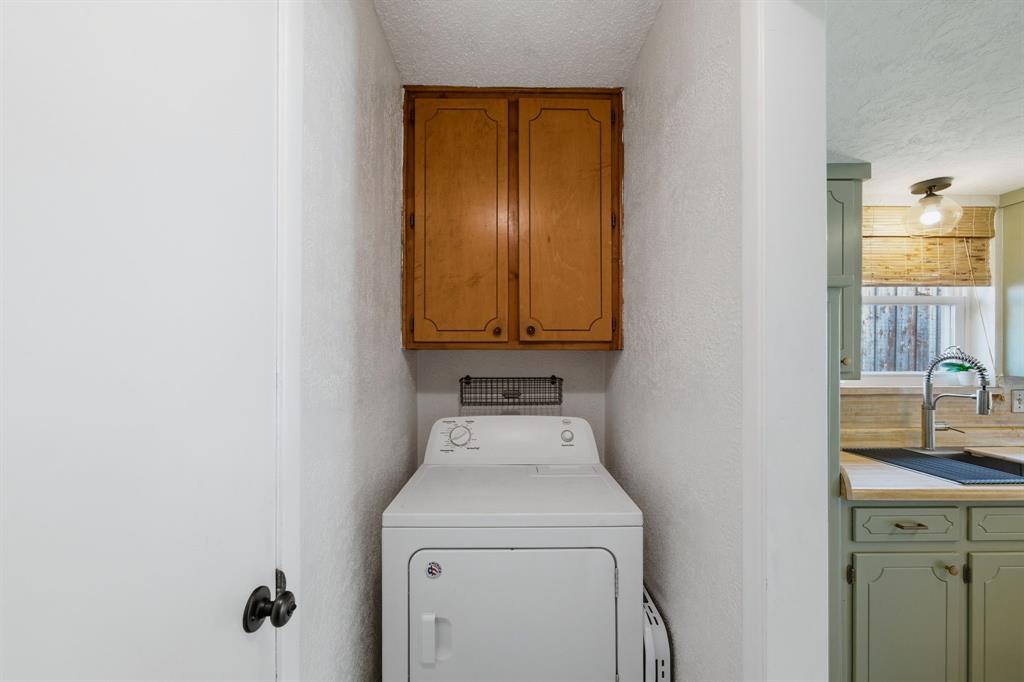 224 Overcrest Drive Benbrook, TX 76126 - Photo 29 of 39 a bathroom with a sink and a mirror