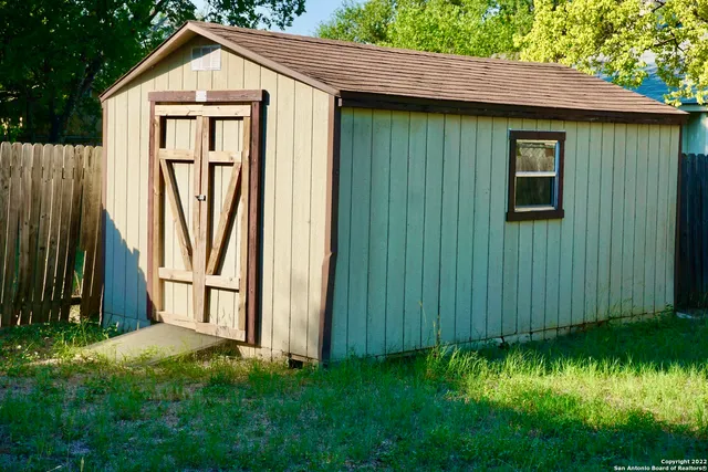 a house with a tree in front of it