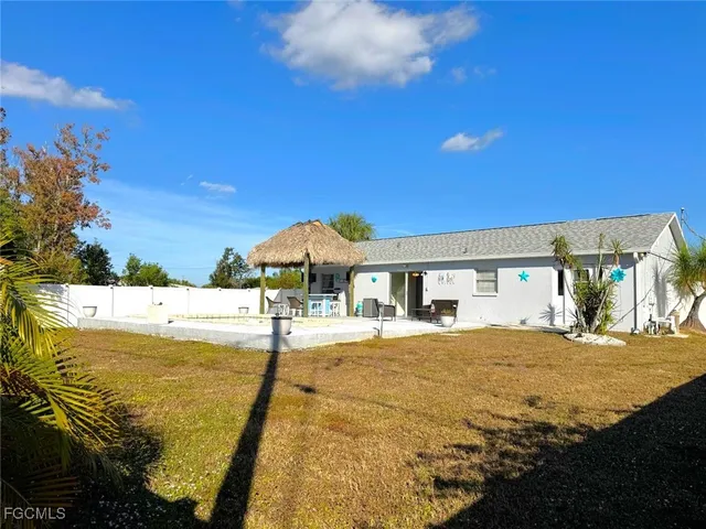 a view of an empty room and a window