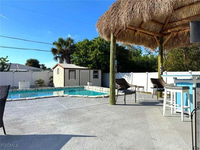a view of house with a big yard