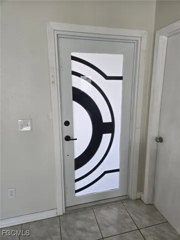 a view of an entryway with sitting space