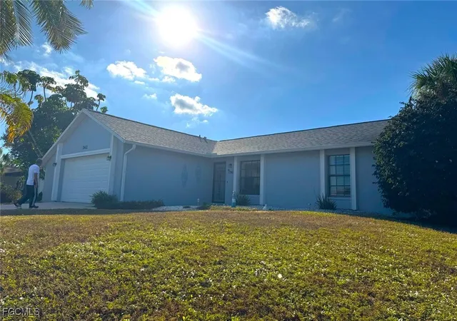 a view of an empty room with a garage