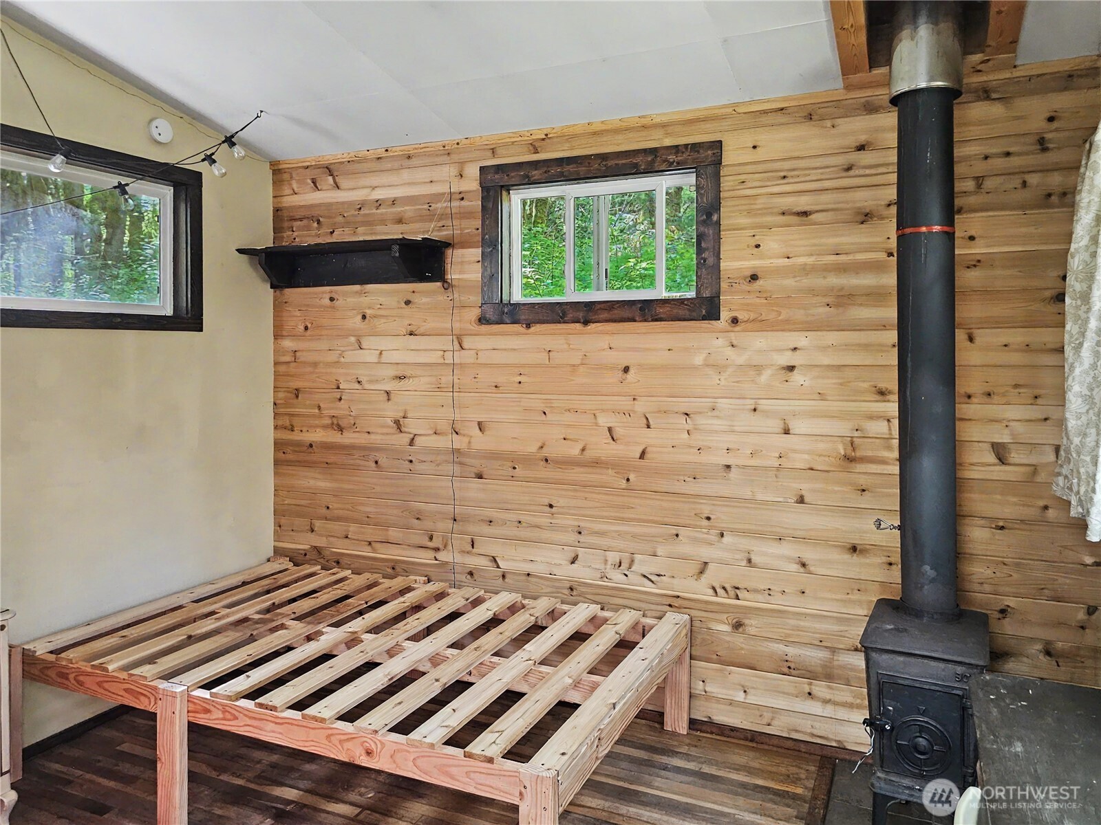 313 Larch Road Quilcene, WA 98376 - Photo 14 of 20 a view of an entryway with wooden floor