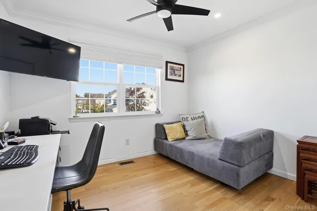 a hallway with windows and stairs