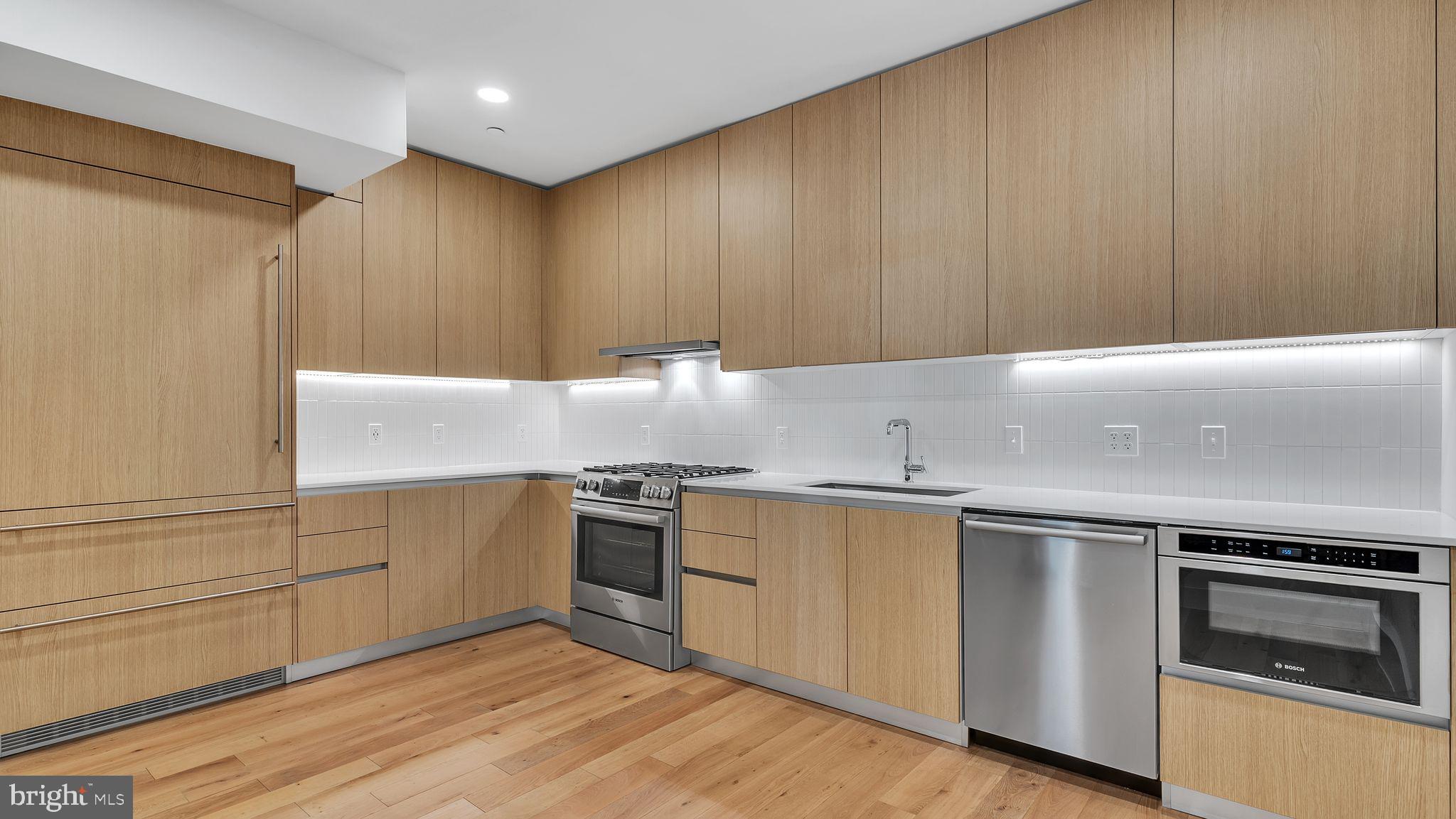 1309 E Street Southeast Washington, DC 20003 - Photo 8 of 33 Sleek Euro Cabinets with Plenty of Counter Space