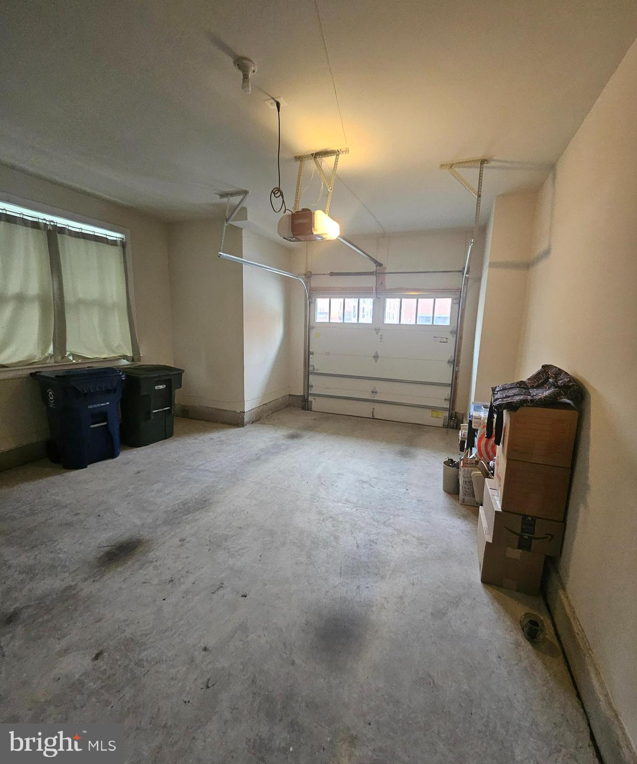 620 East Howell Avenue, Unit 101 Alexandria, VA 22301 - Photo 13 of 26 One car garage from the rear