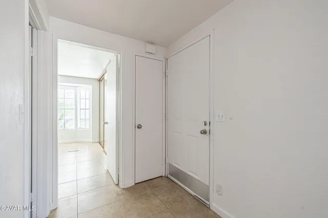a view of entryway with white walls