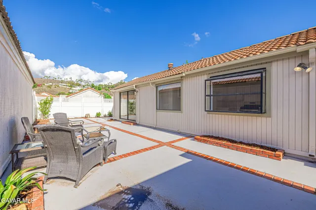 a view of outdoor space swimming pool and green space