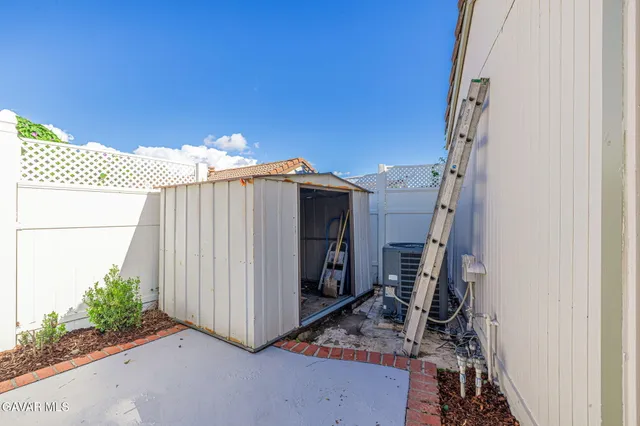 a view of a house with a swimming pool