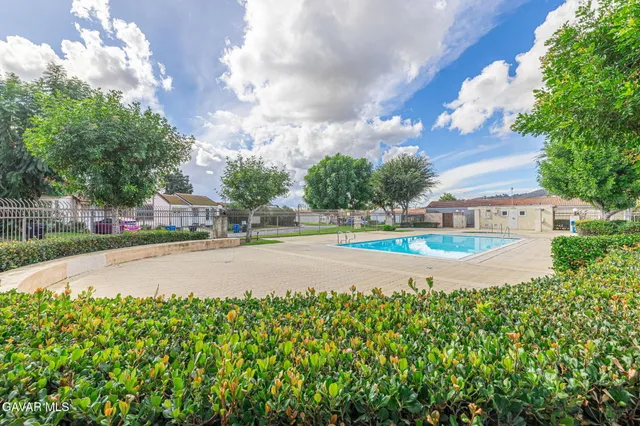 a view of outdoor space yard and swimming pool