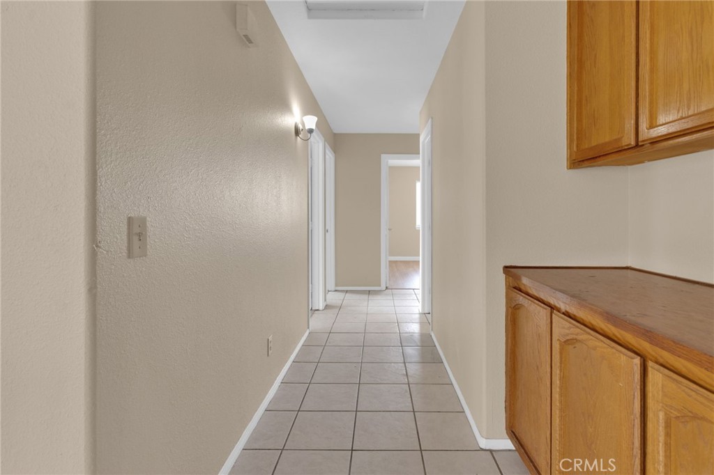 15160 Cheyenne Road Apple Valley, CA 92307 - Photo 21 of 55 a view of a hallway to the house