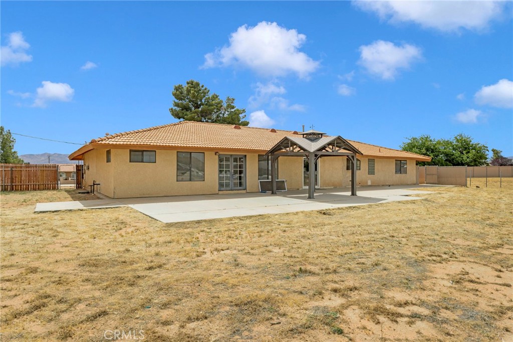 15160 Cheyenne Road Apple Valley, CA 92307 - Photo 43 of 55 a house with swimming pool in front of it
