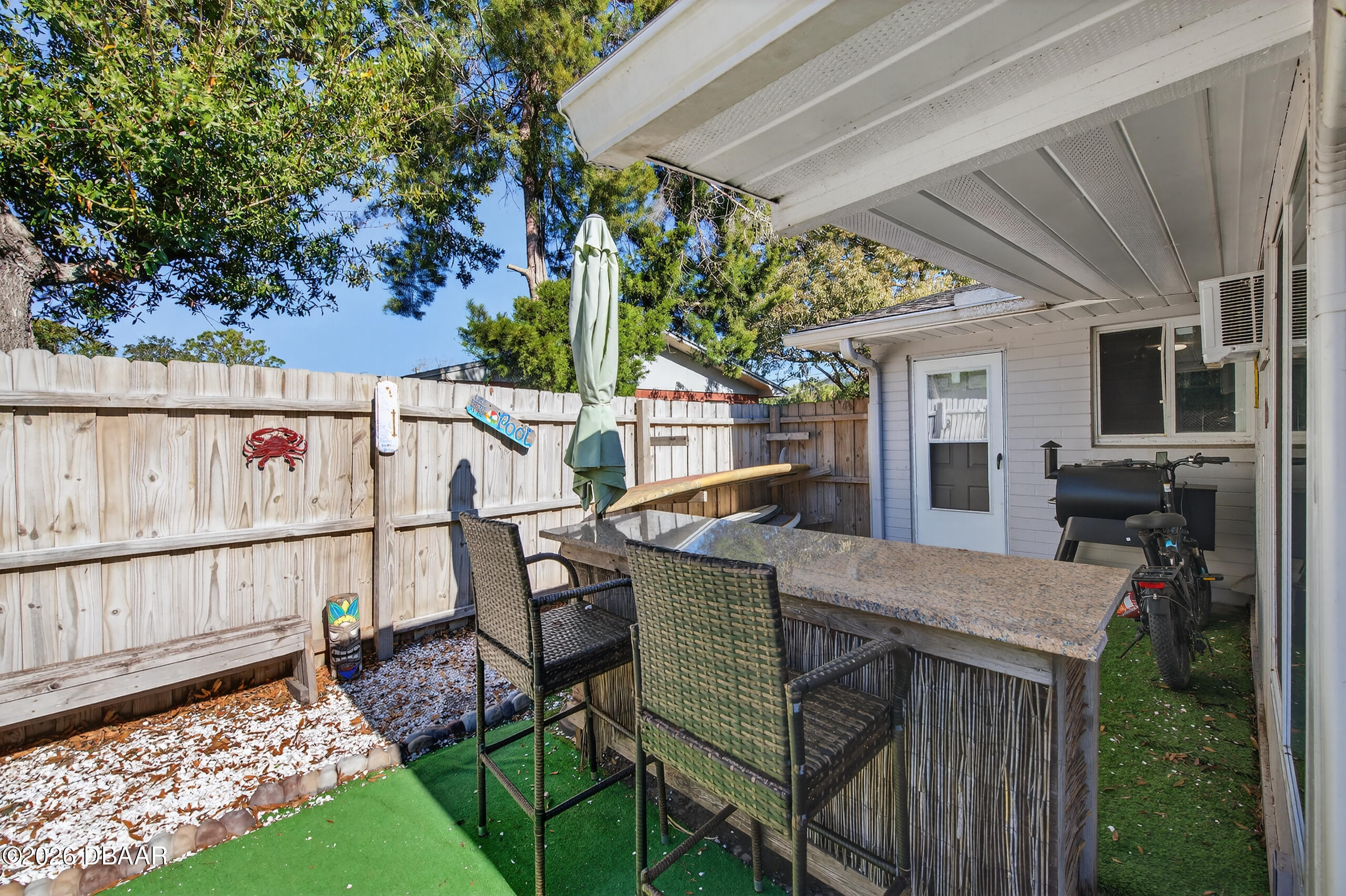 1010 Fernald Street Edgewater, FL 32132 - Photo 31 of 43 a view of house with backyard and furniture