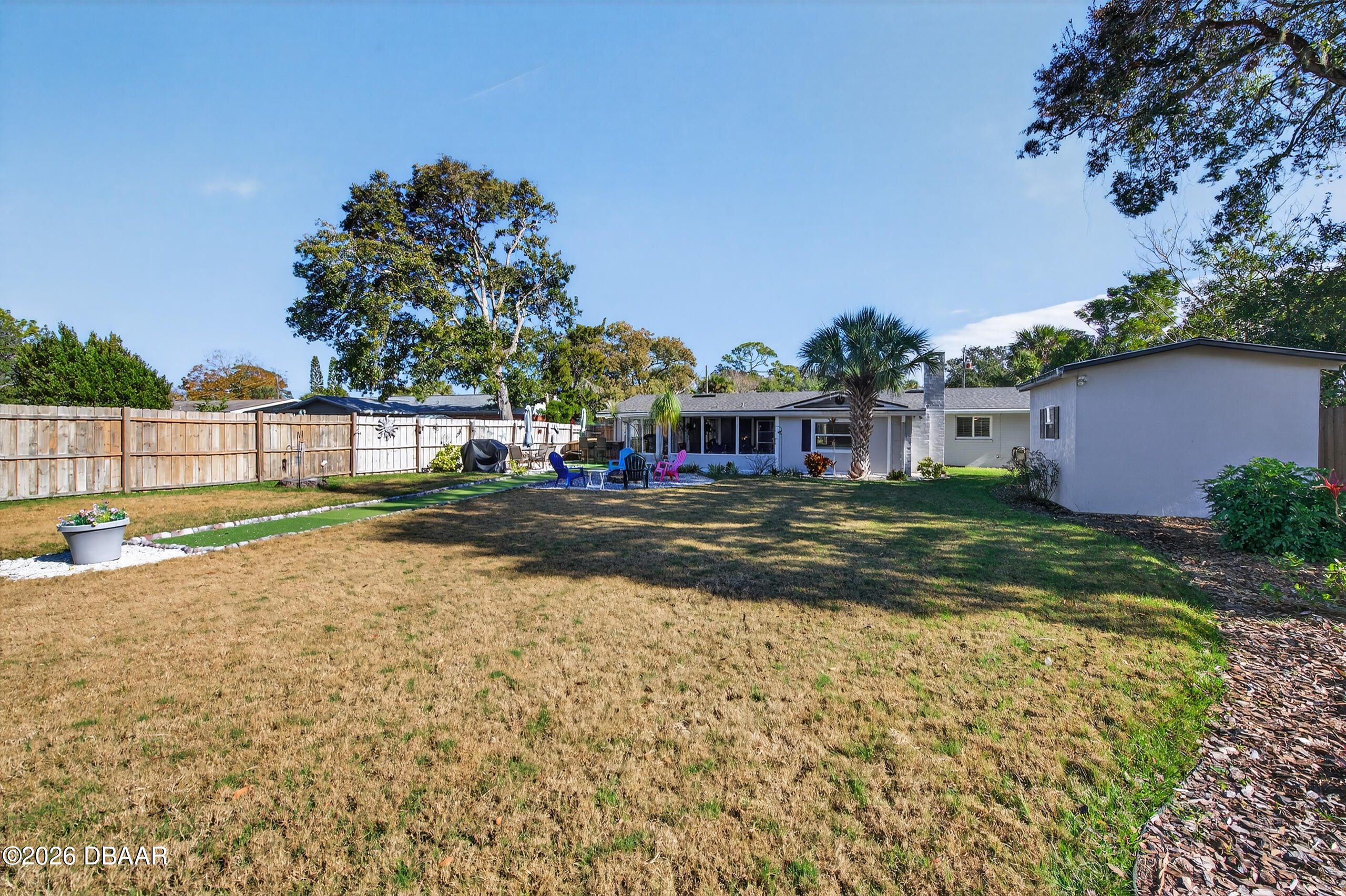 1010 Fernald Street Edgewater, FL 32132 - Photo 35 of 43 a view of backyard with green space