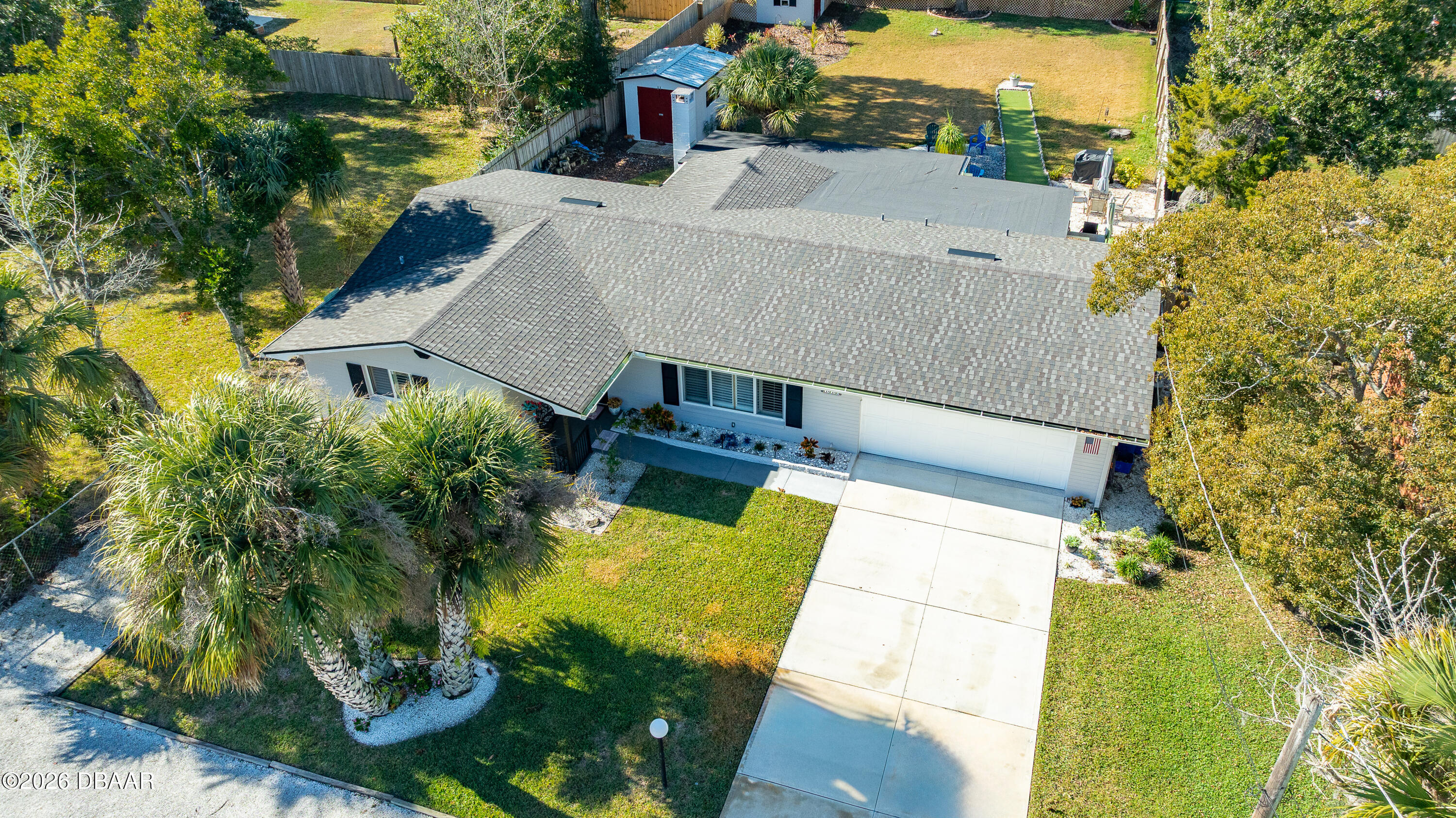1010 Fernald Street Edgewater, FL 32132 - Photo 37 of 43 an aerial view of a house with swimming pool garden and patio