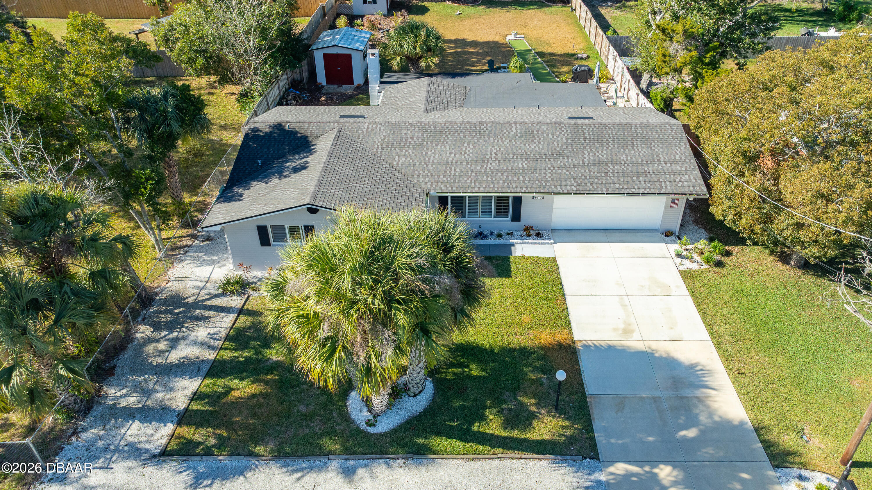 1010 Fernald Street Edgewater, FL 32132 - Photo 39 of 43 a aerial view of a house with a yard