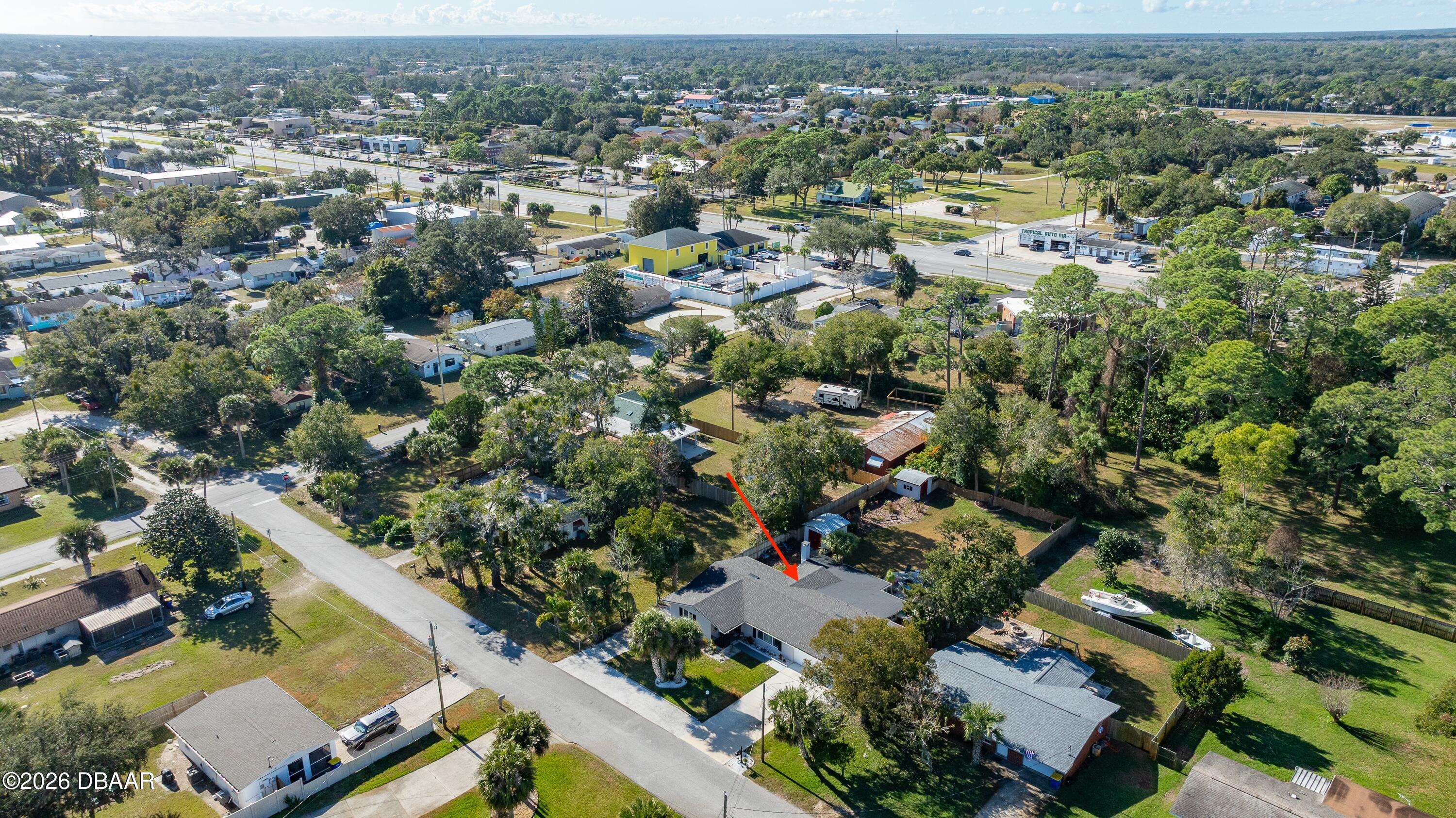 1010 Fernald Street Edgewater, FL 32132 - Photo 42 of 43 an aerial view of residential houses with outdoor space and trees