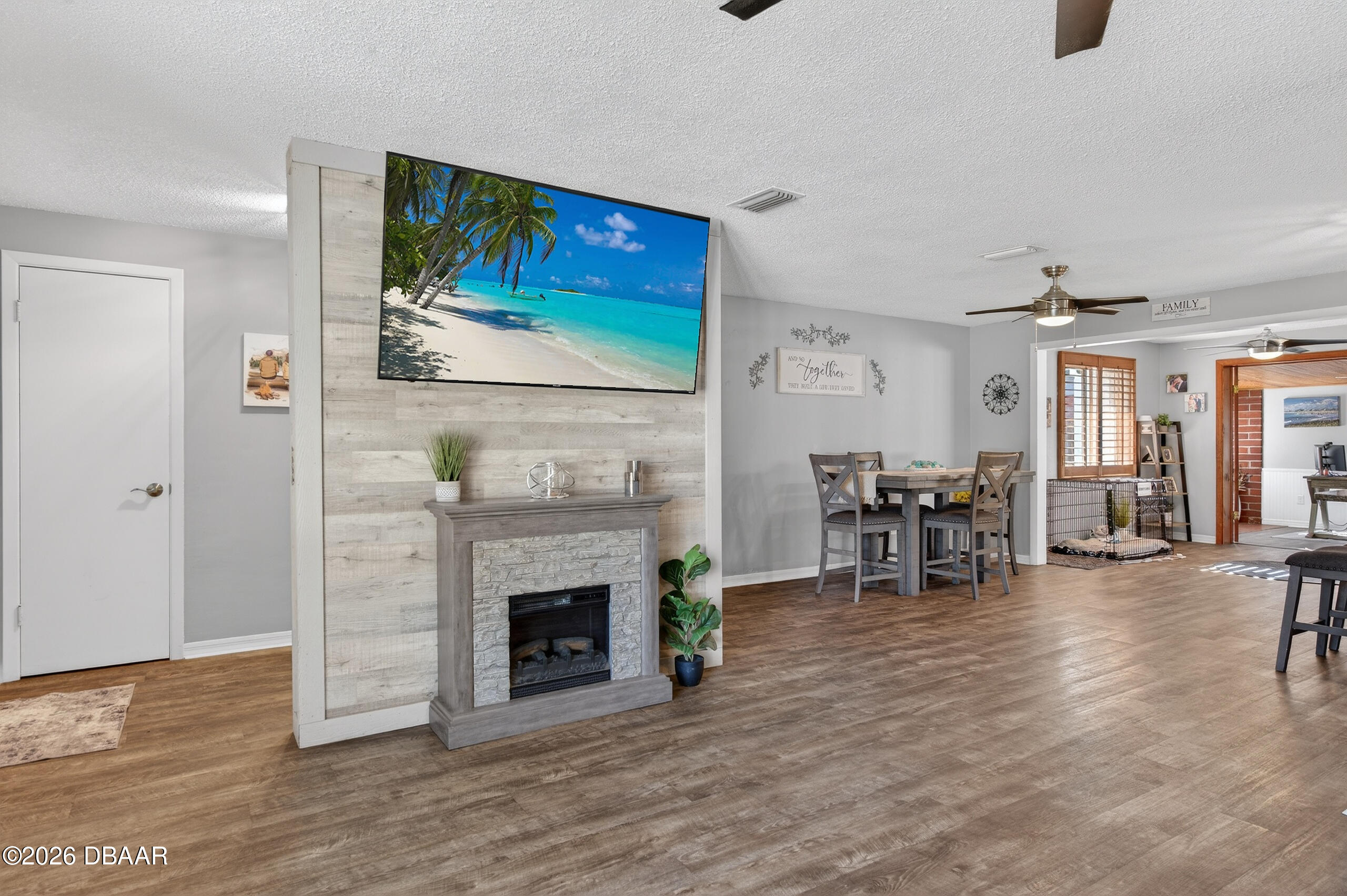 1010 Fernald Street Edgewater, FL 32132 - Photo 8 of 43 a view of a livingroom with furniture and a fireplace