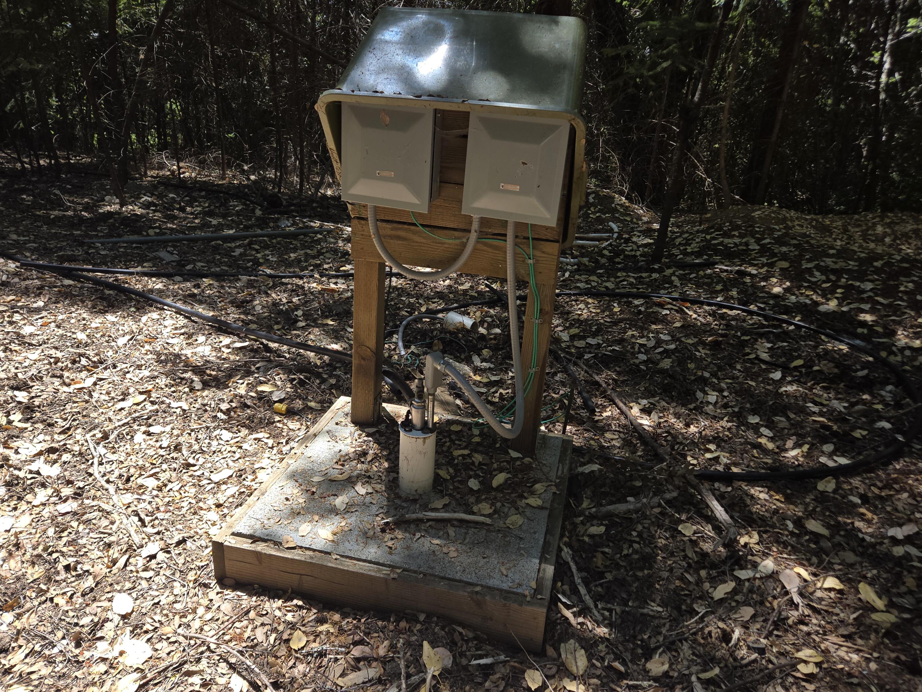4800 Hansen Ranch Road Garberville, CA 95542 - Photo 12 of 23 a table and chairs in a garden