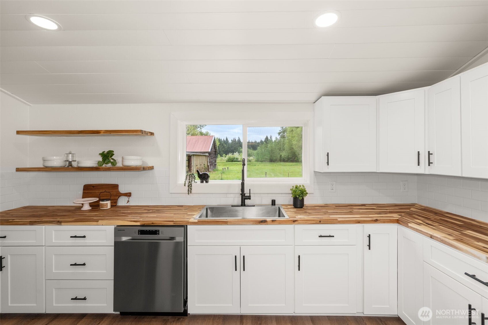 2222 Cooks Hill Road Centralia, WA 98531 - Photo 6 of 36 a kitchen with granite countertop white cabinets and white appliances
