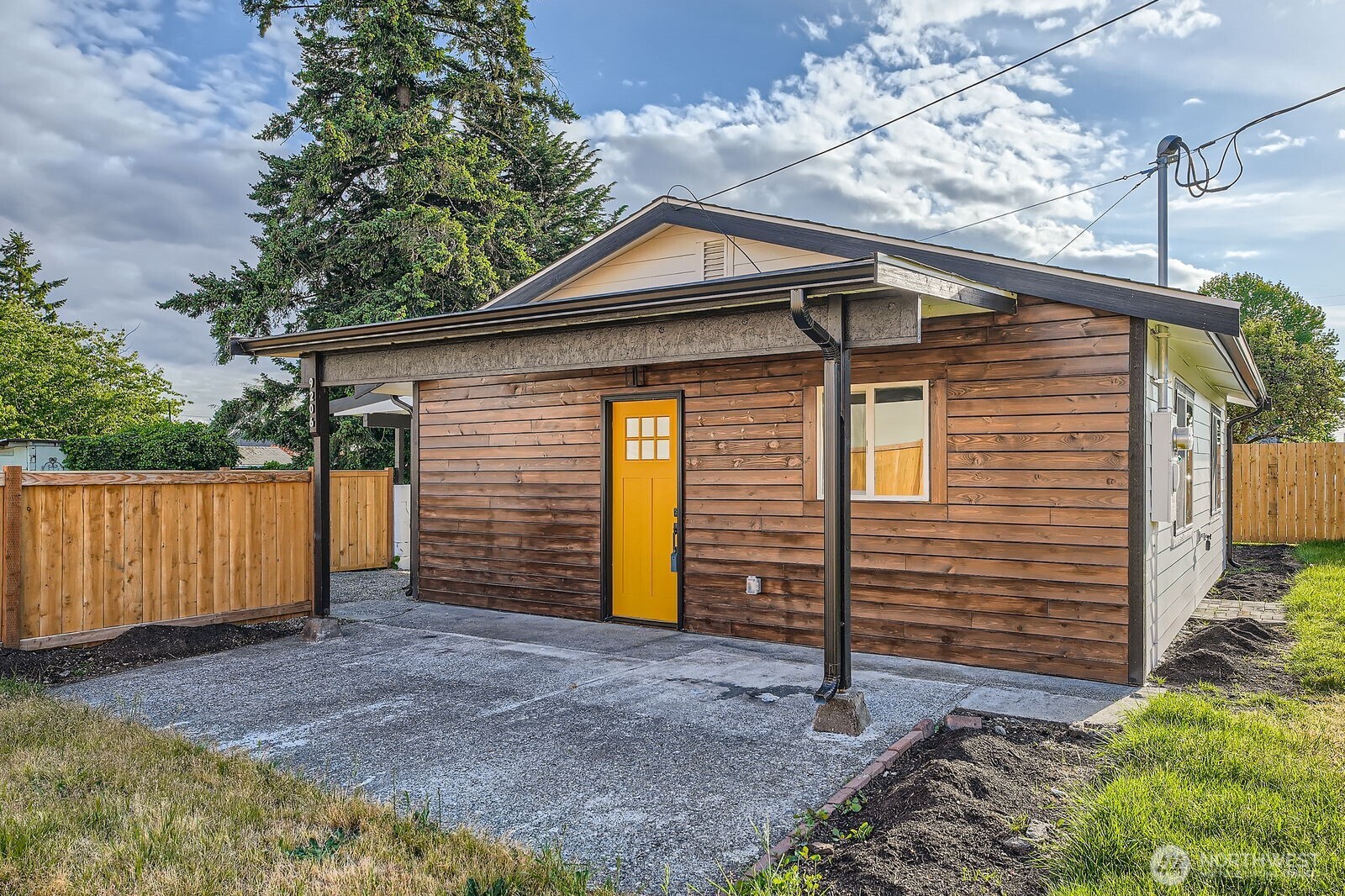 9206 33rd Ave Court South Lakewood, WA 98499 - Photo 2 of 21 a view of a house with wooden fence
