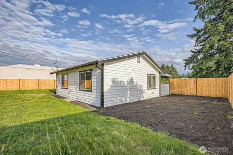 a view of a backyard with a garden