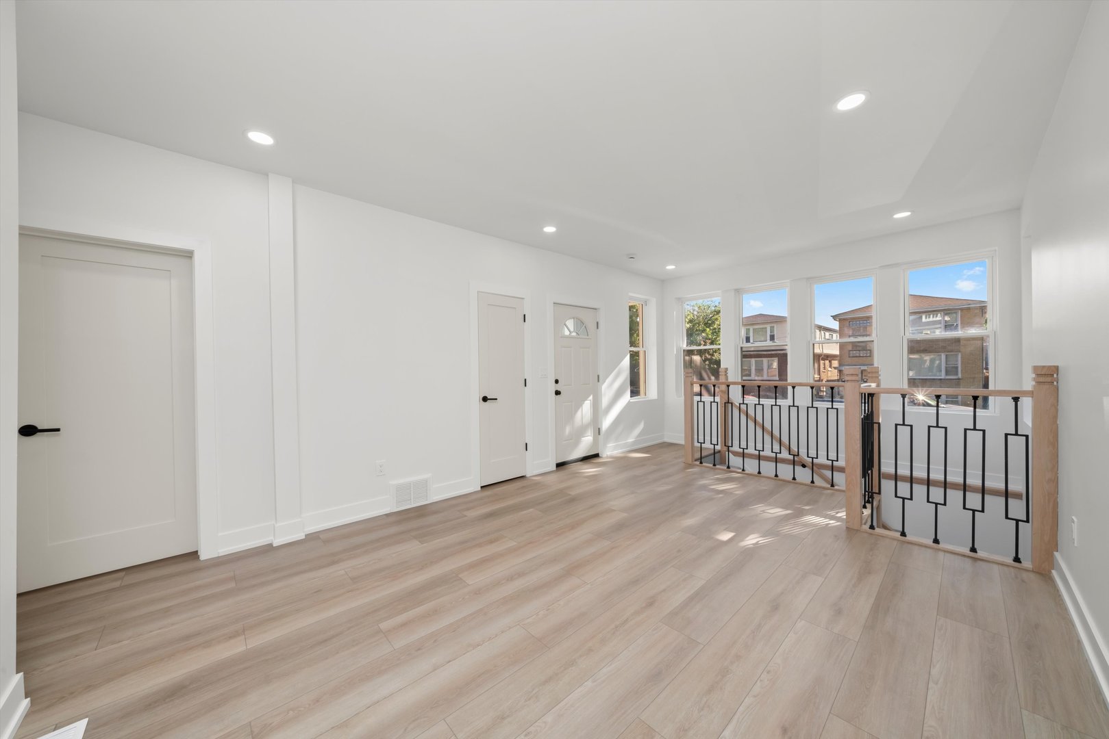 7150 South Talman Avenue, Unit 1 Chicago, IL 60629 - Photo 4 of 19 a view of a hallway with wooden floor