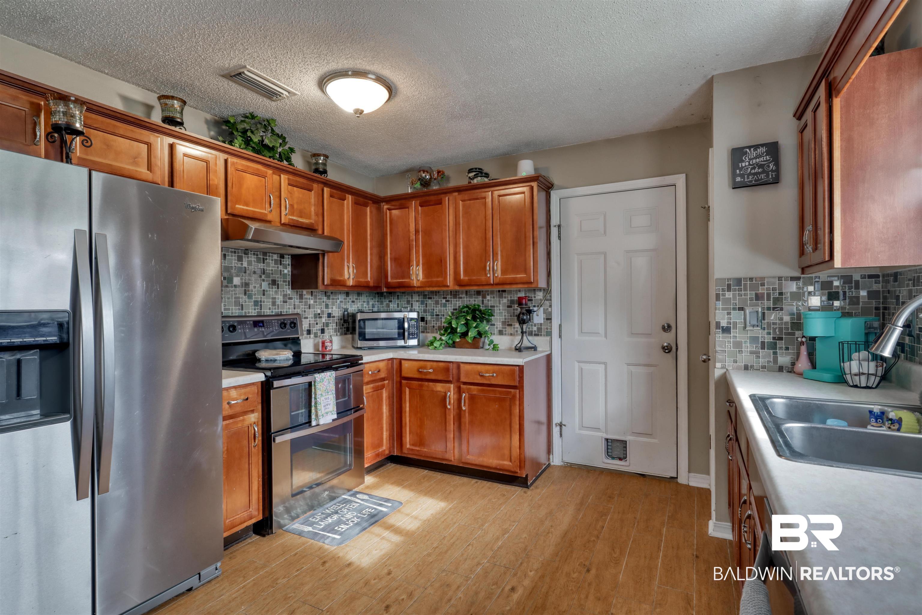 8833 Sherman Road Foley, AL 36535 - Photo 16 of 26 Kitchen