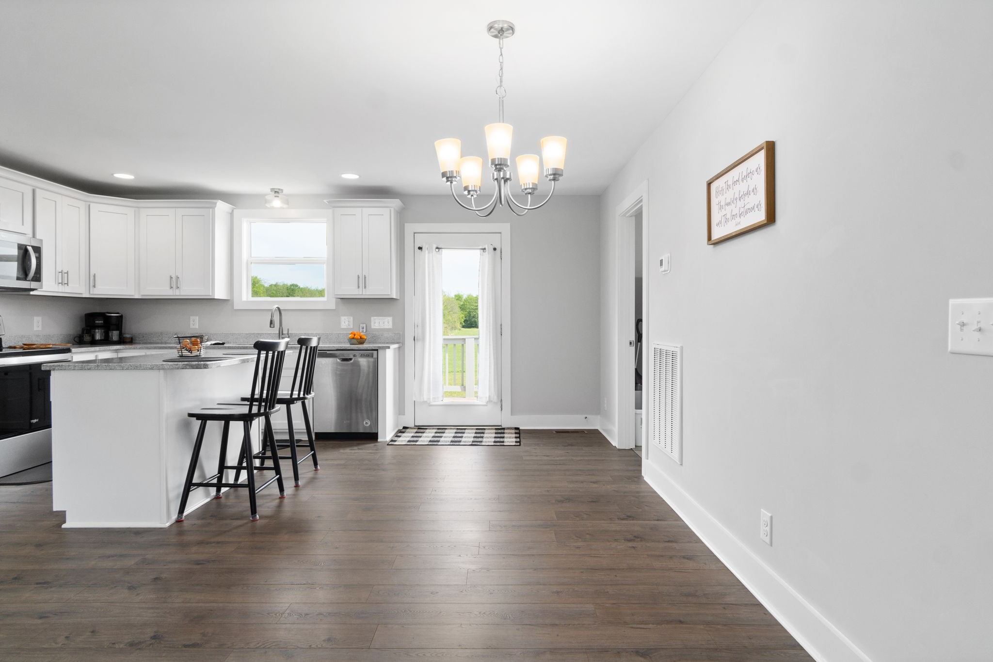 330 Woodruff Road Adams, TN 37010 - Photo 12 of 31 a view of a dining room with furniture window and wooden floor