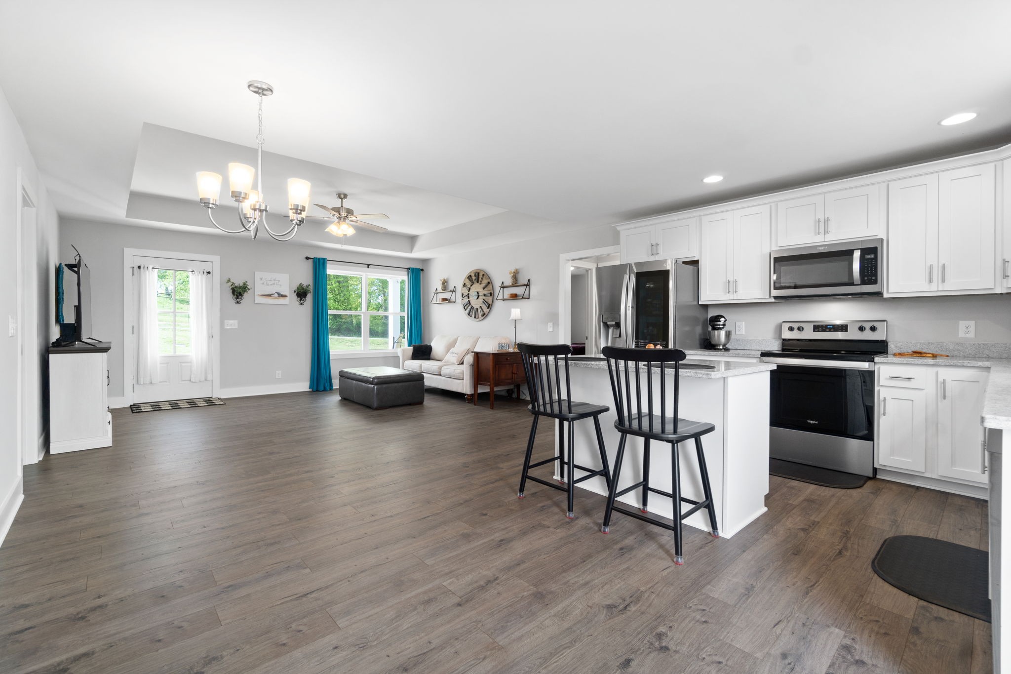 330 Woodruff Road Adams, TN 37010 - Photo 13 of 31 a open kitchen with furniture wooden floor and stainless steel appliances
