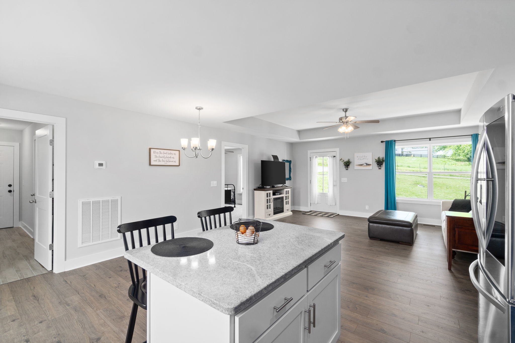 330 Woodruff Road Adams, TN 37010 - Photo 18 of 31 a view of a dining room with furniture and wooden floor