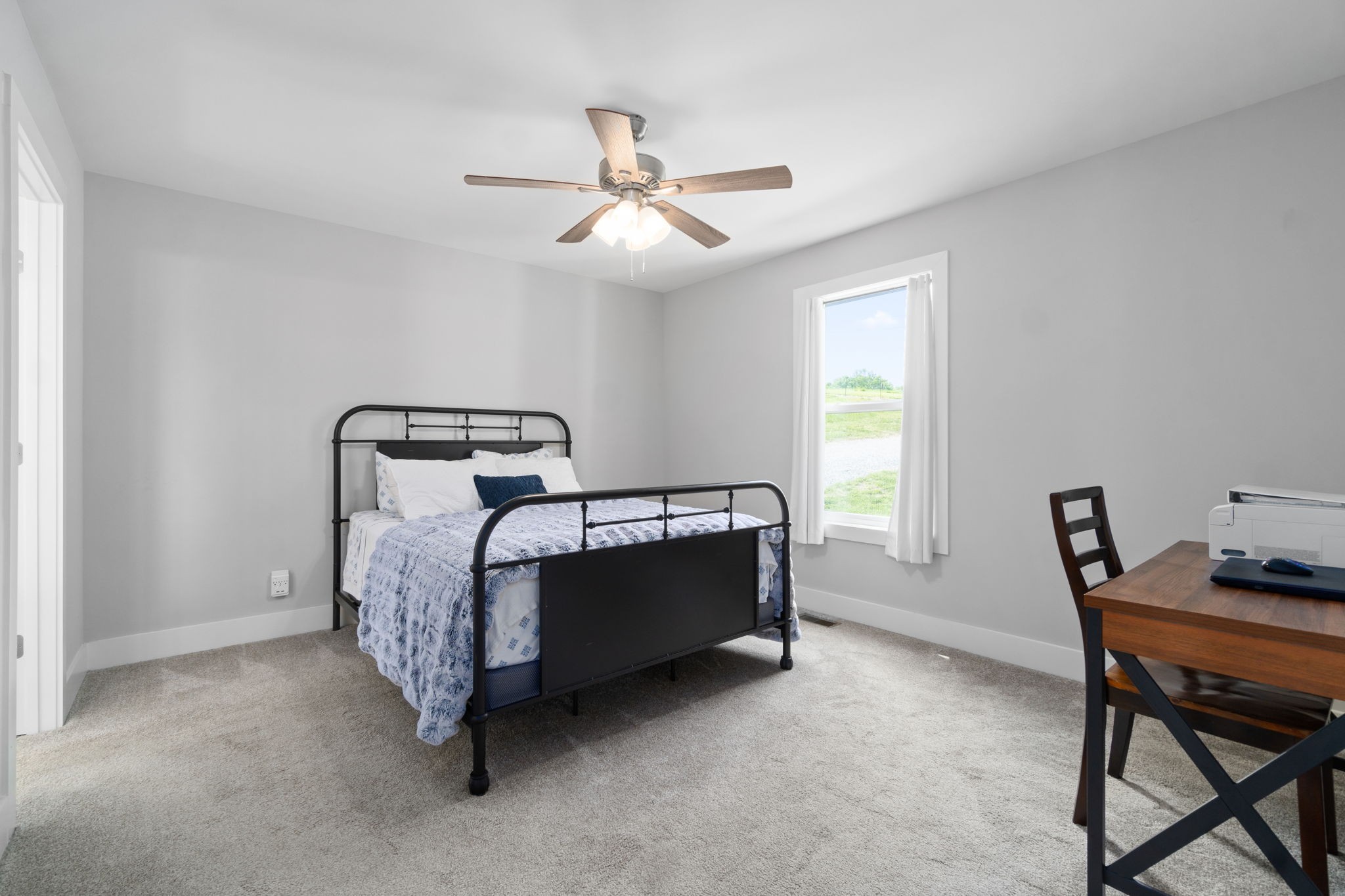 330 Woodruff Road Adams, TN 37010 - Photo 23 of 31 a bedroom with a bed and a desk