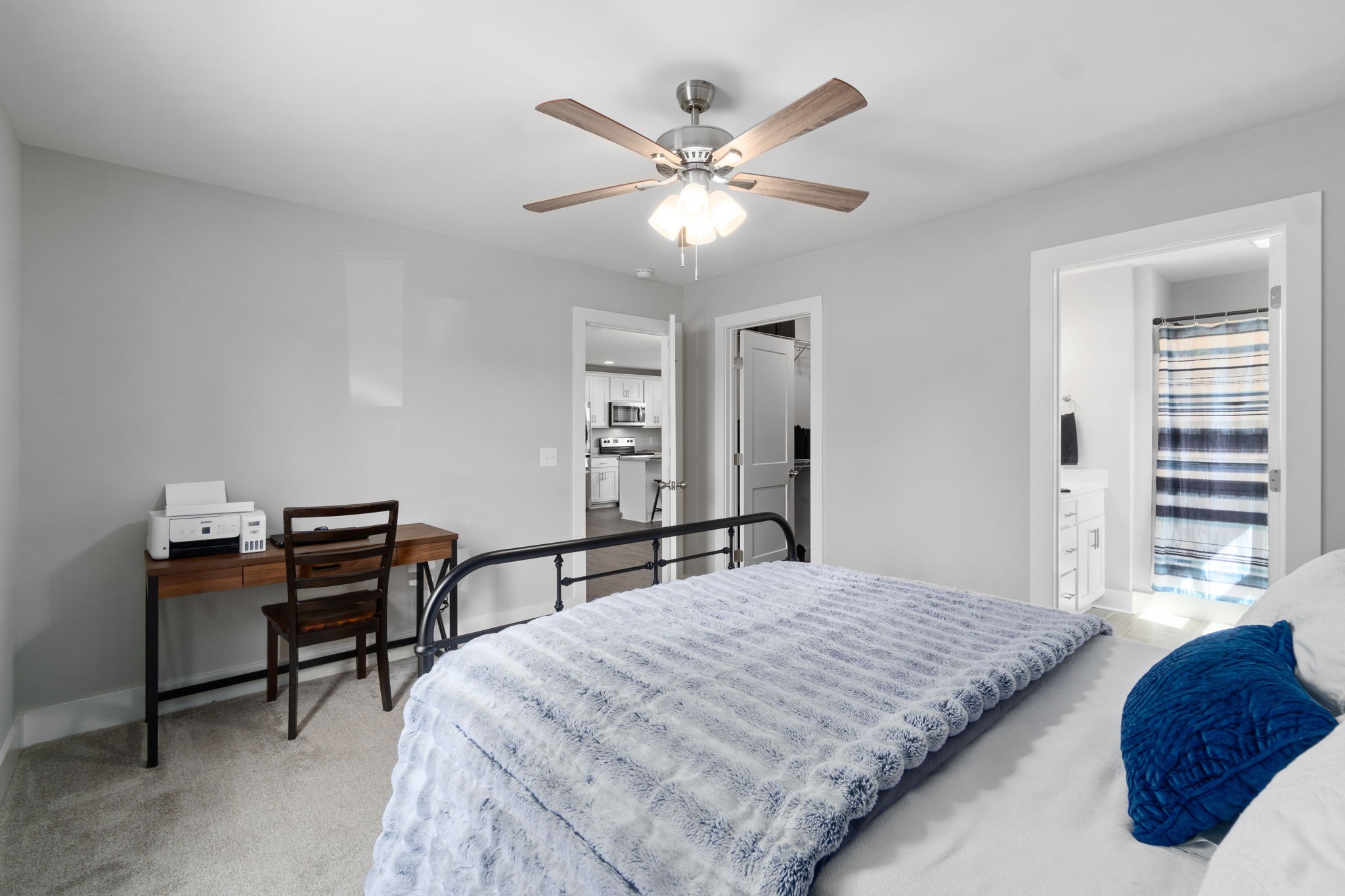 330 Woodruff Road Adams, TN 37010 - Photo 24 of 31 a bedroom with a bed and a chandelier