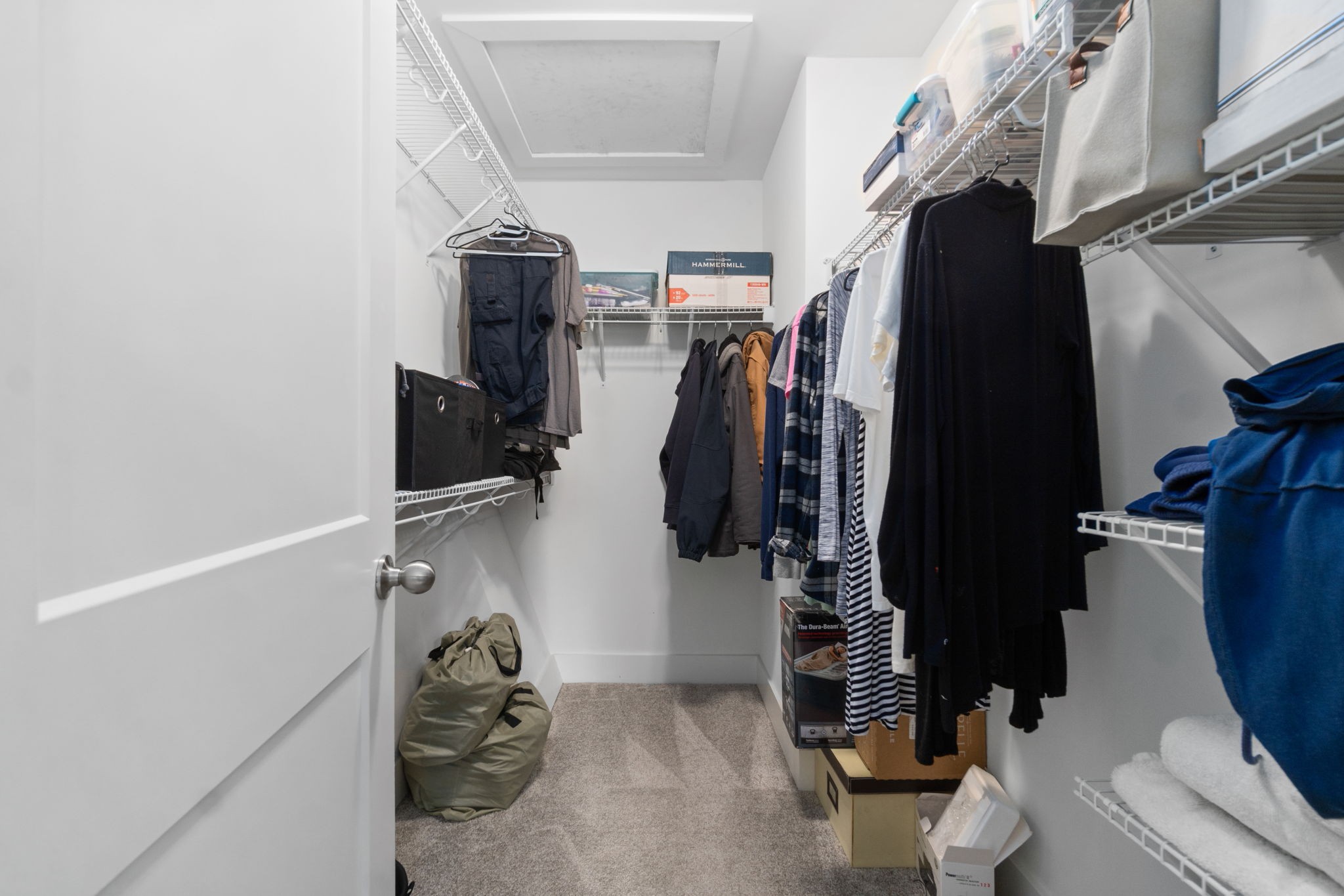 330 Woodruff Road Adams, TN 37010 - Photo 25 of 31 a view of walk in closet with clothes and shoes
