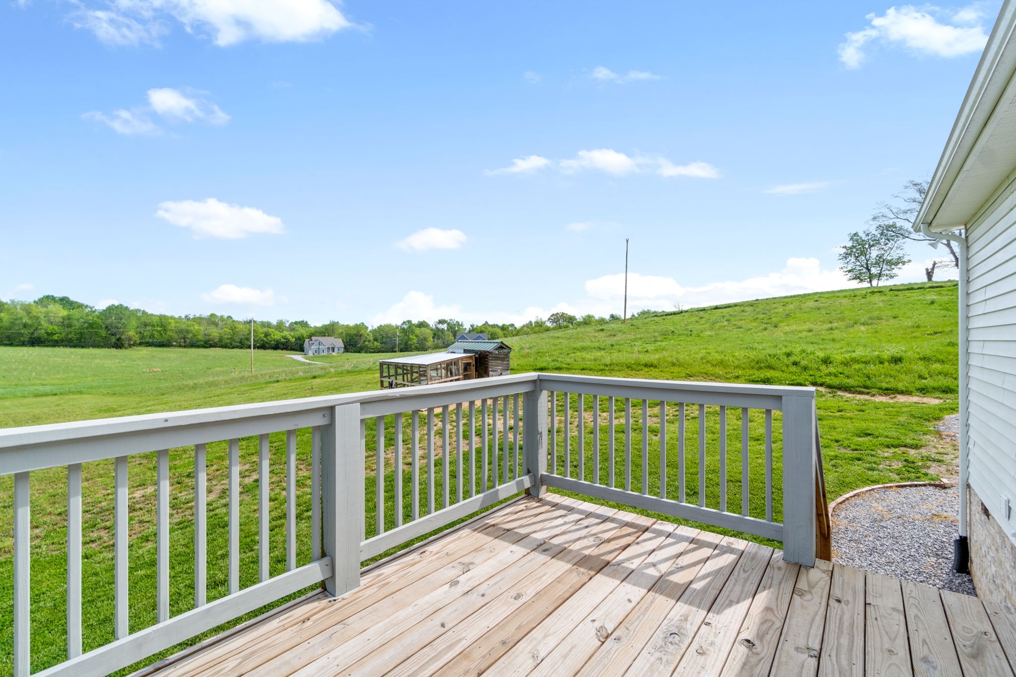 330 Woodruff Road Adams, TN 37010 - Photo 28 of 31 a view of a balcony with wooden floor