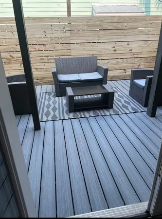 a view of wooden floor with a bench