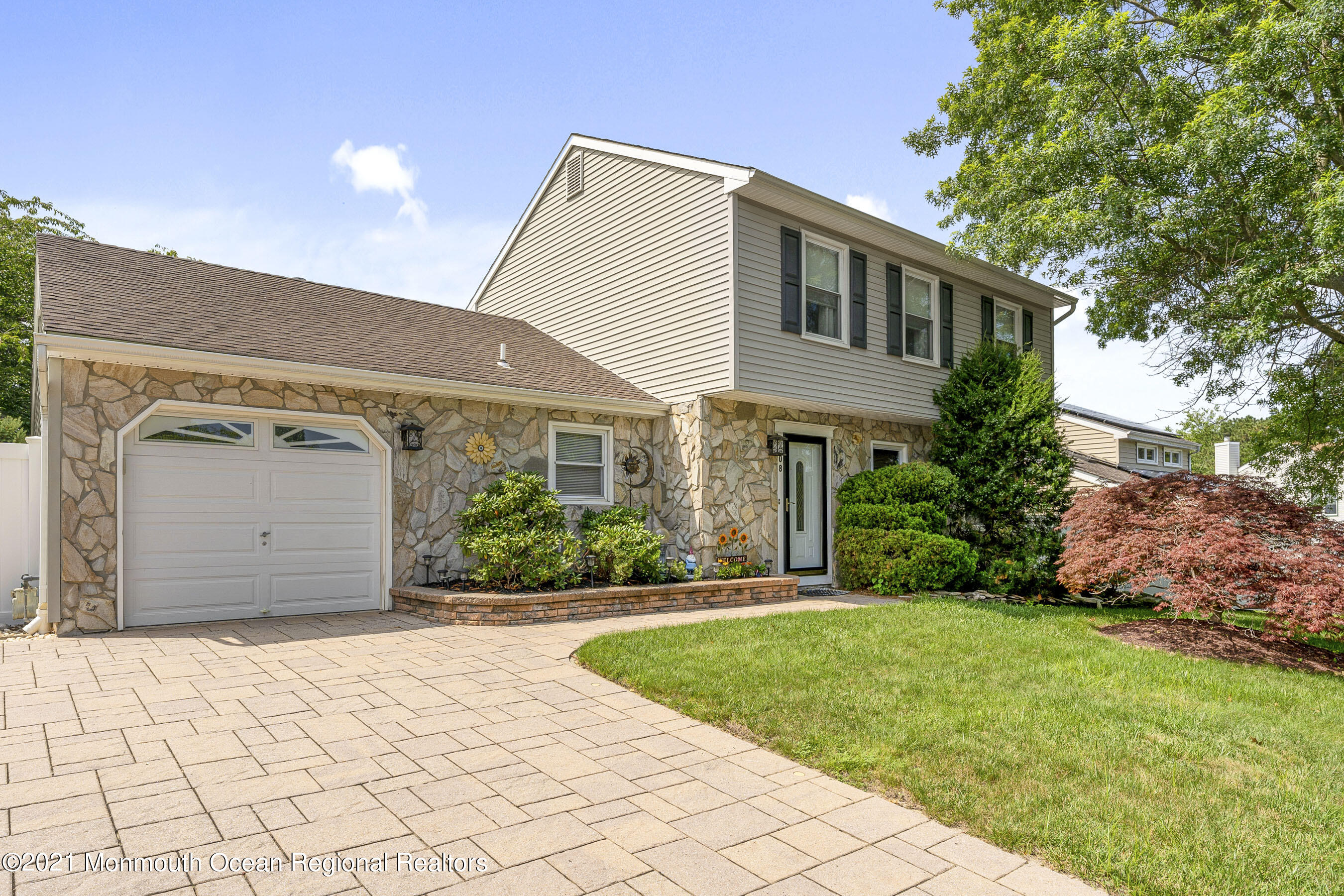 808 Constitution Drive Brick, NJ 08724 - Photo 2 of 27 a view of a house with a yard