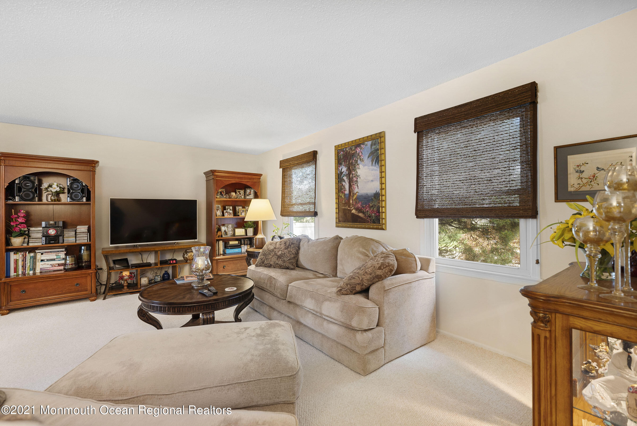 808 Constitution Drive Brick, NJ 08724 - Photo 4 of 27 a living room with furniture and a flat screen tv